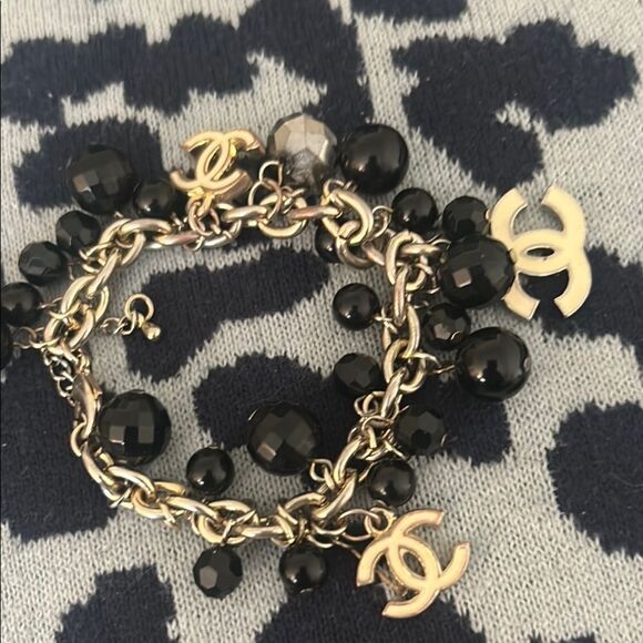 Chanel Black and Gold Charm Bracelet - Picture 1 of 3